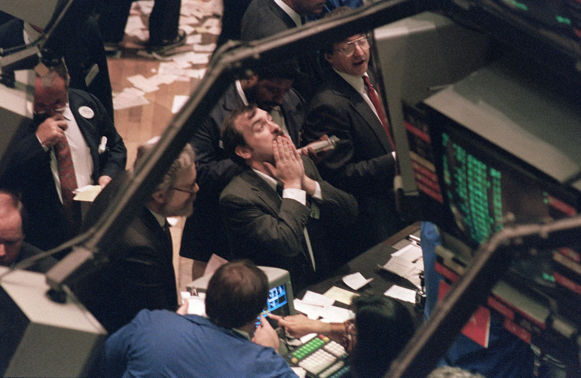 Man reacts in anguish due to market crash on wall street